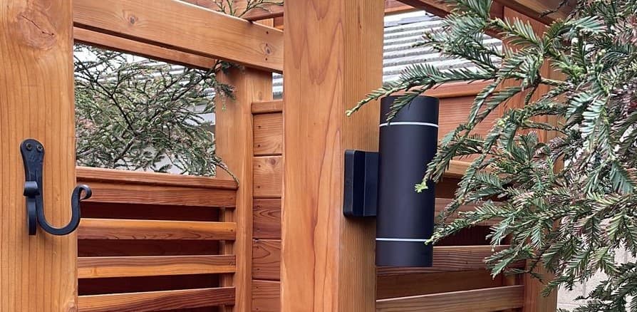 Outdoor generator installed beside a deck